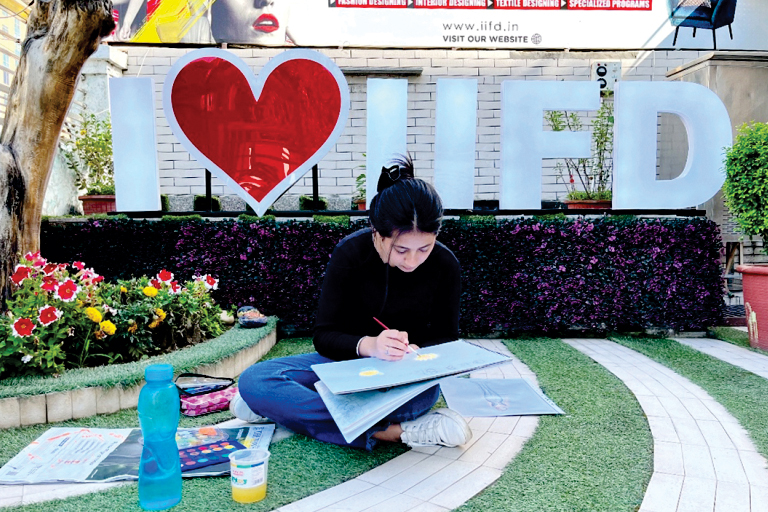 Student Working At IIFD Campus
